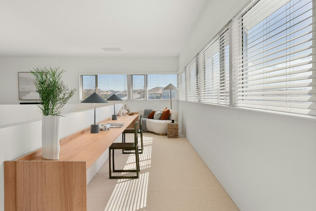 Boutique real estate office interior with warm minimalist design